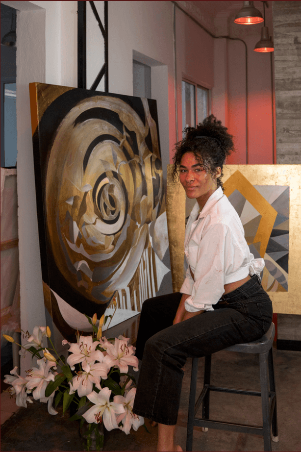 Gigi Recny painting in the studio